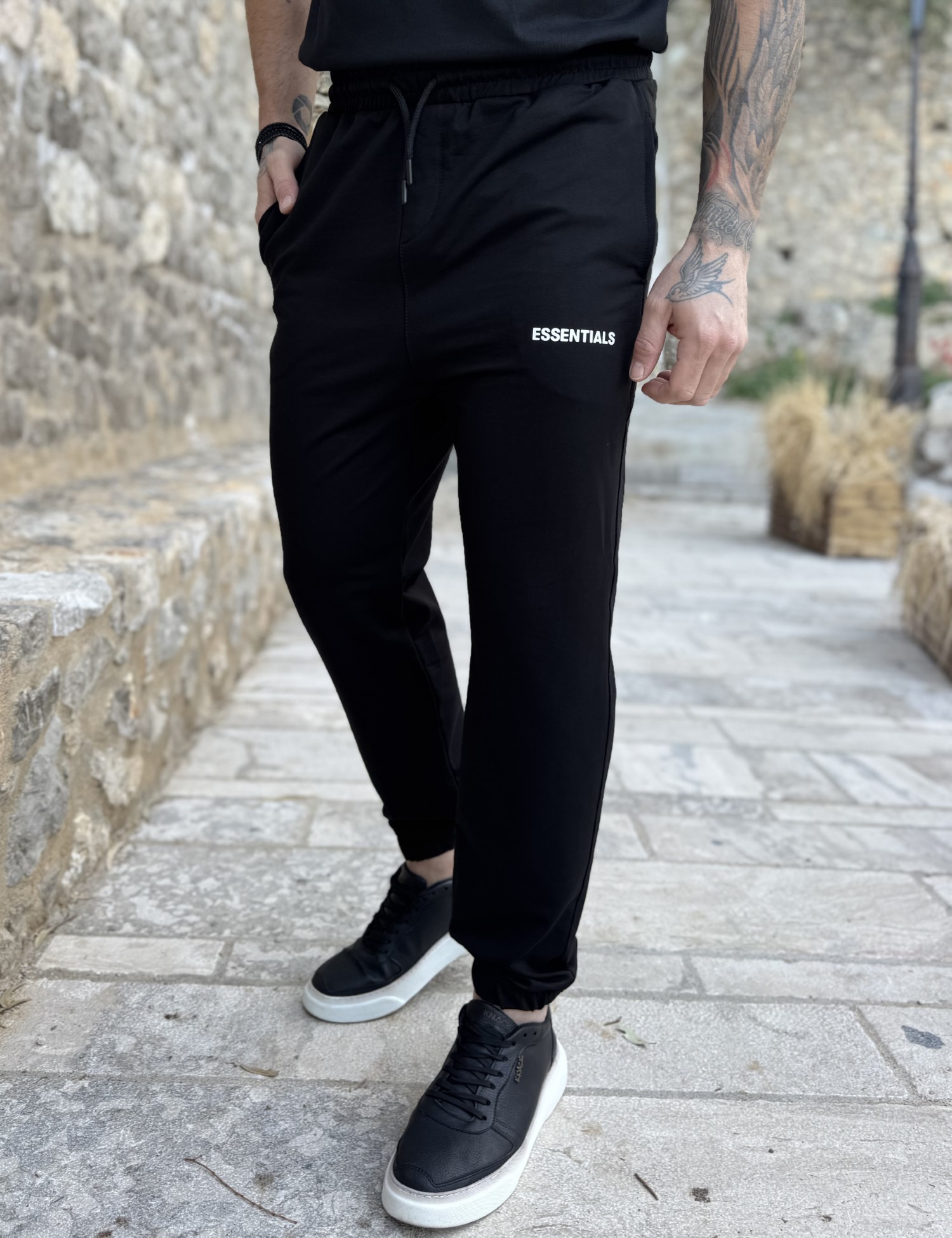 Ανδρική μαύρη φόρμα με λάστιχο και λογότυπο στο πλάι ES302M φωτογραφία